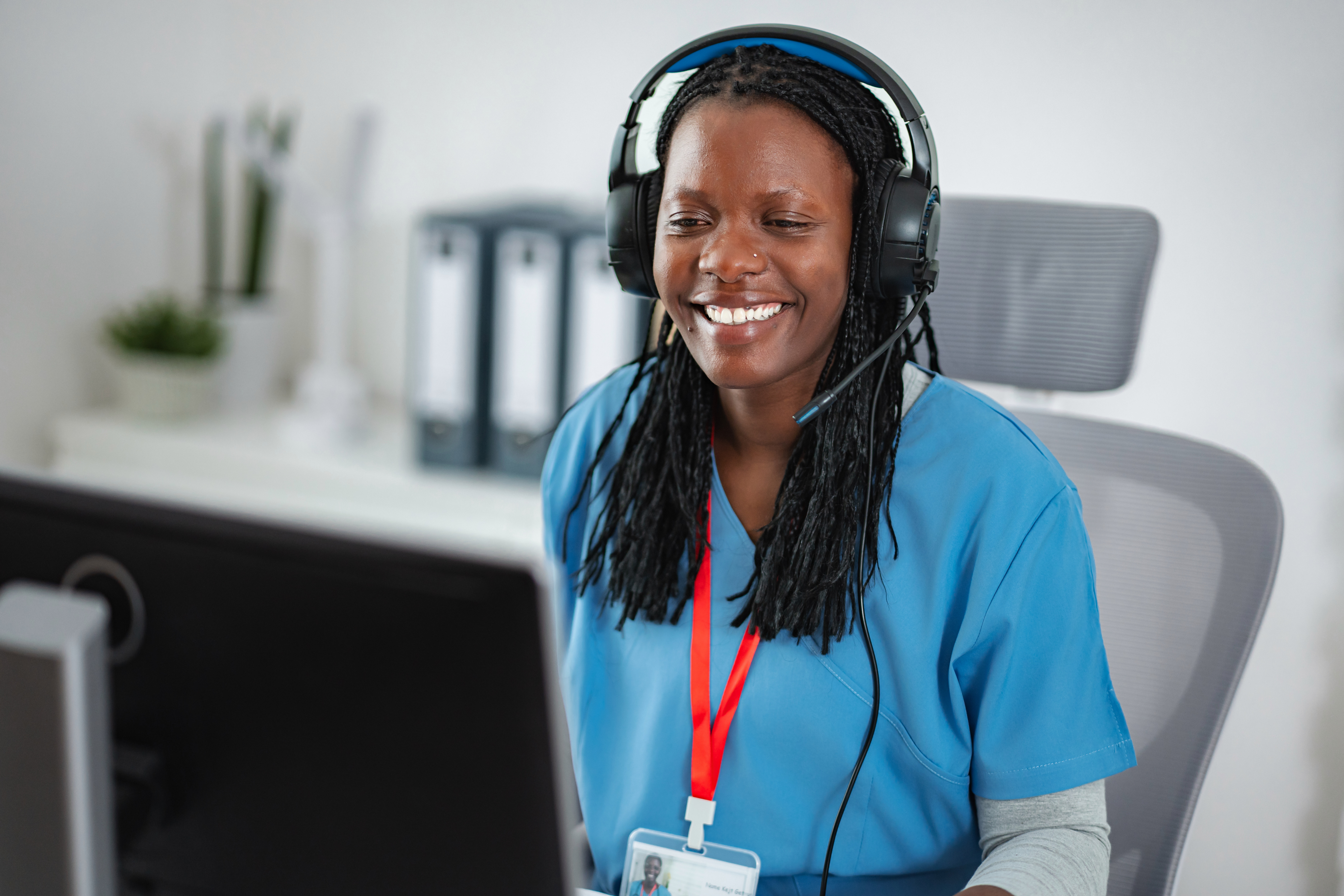 Smiling female healthcare professional providing virtual medical support